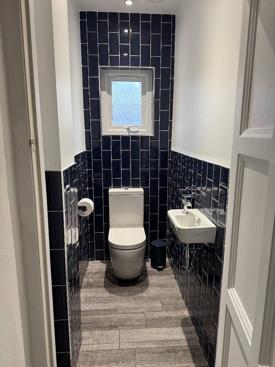 Classic period bathroom with freestanding roll-top bath