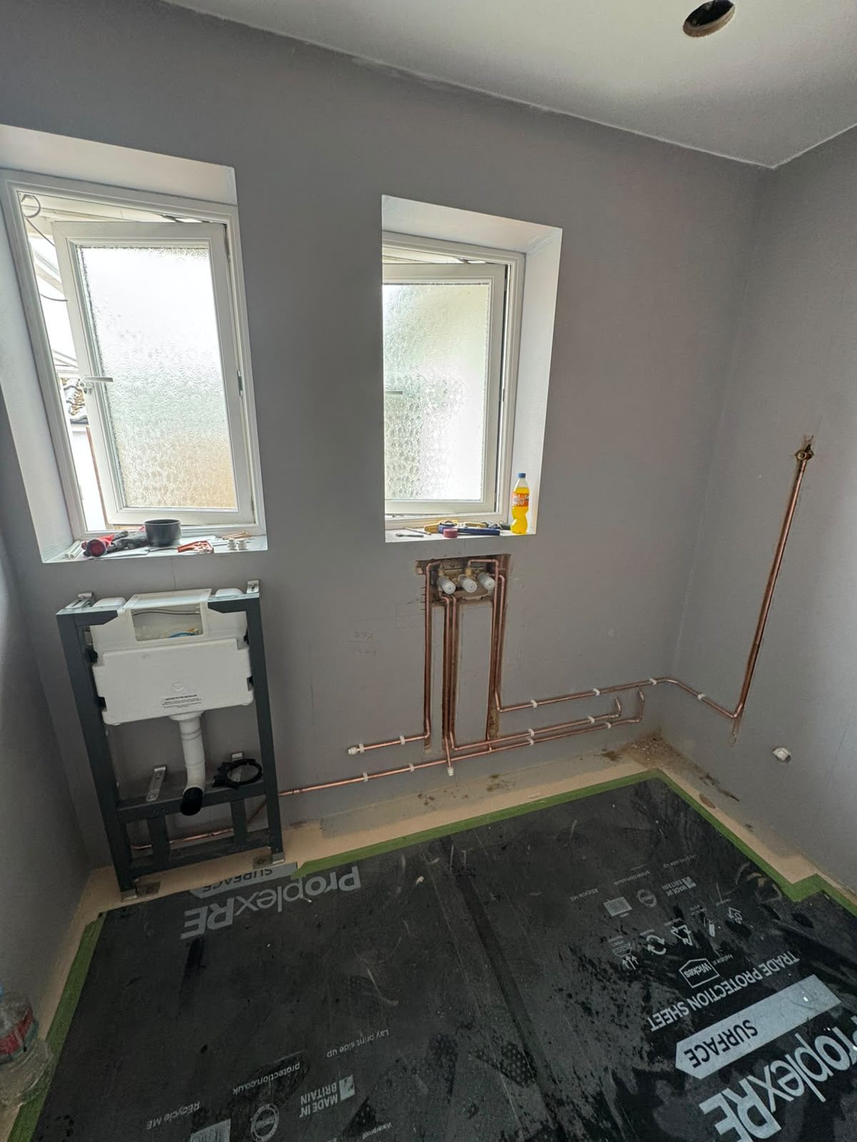 New copper pipework installed during bathroom renovation